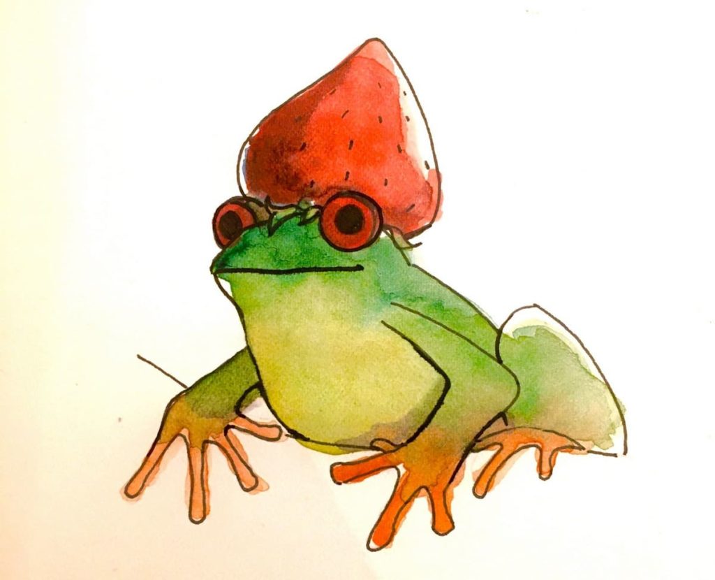 Frosch mit einer Erdbeere auf dem Kopf