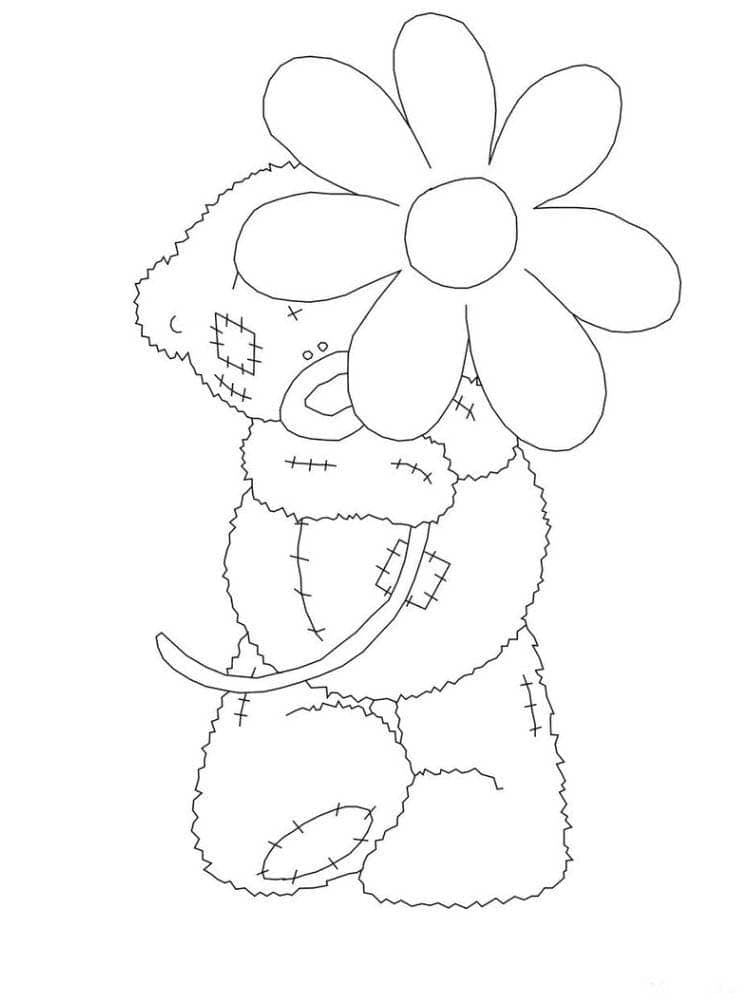 Urso de pelúcia com uma flor